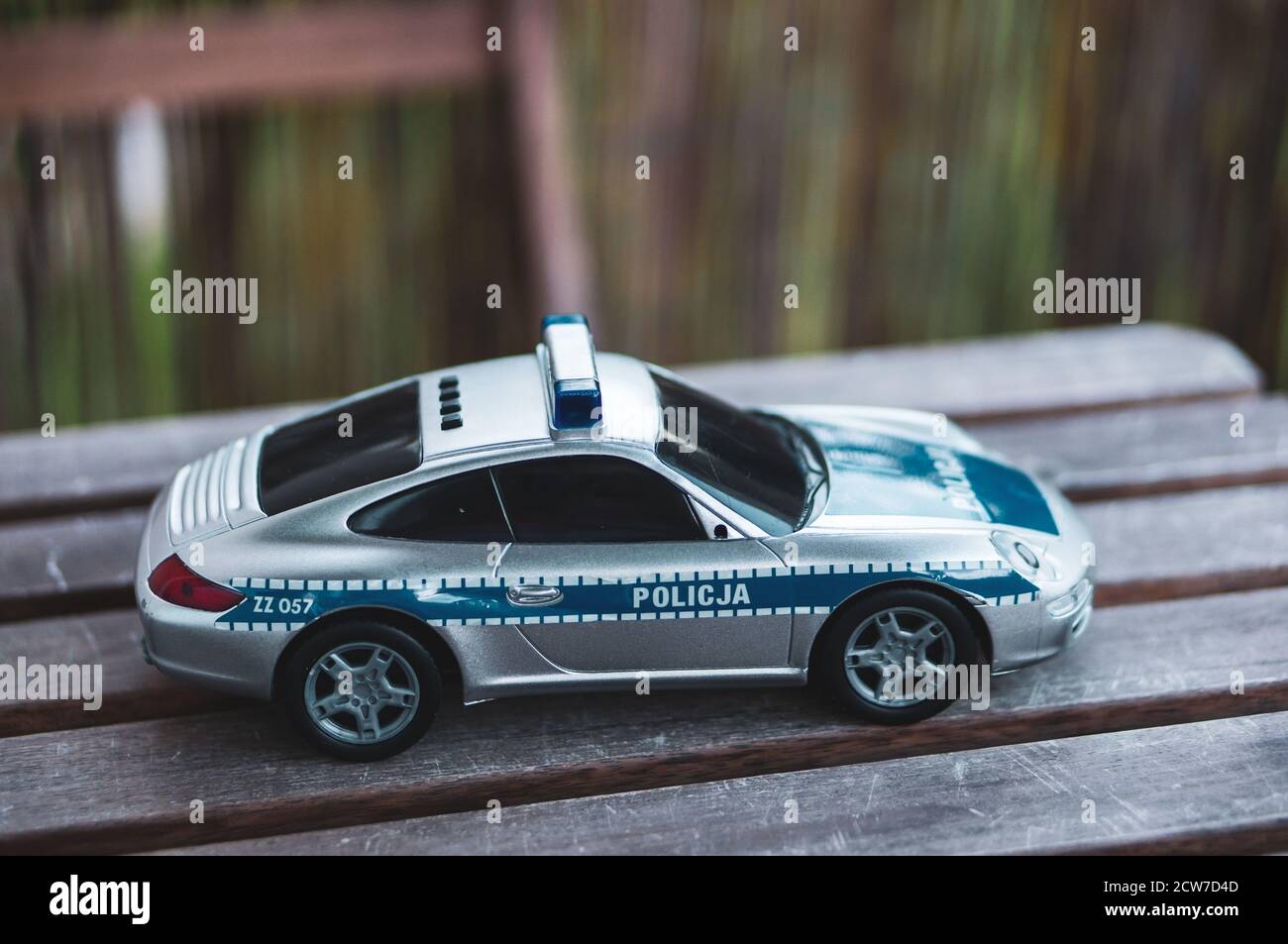POZNAN, POLAND - Sep 10, 2020: Plastic toy Polish Porsche police car on a  wooden table Stock Photo - Alamy