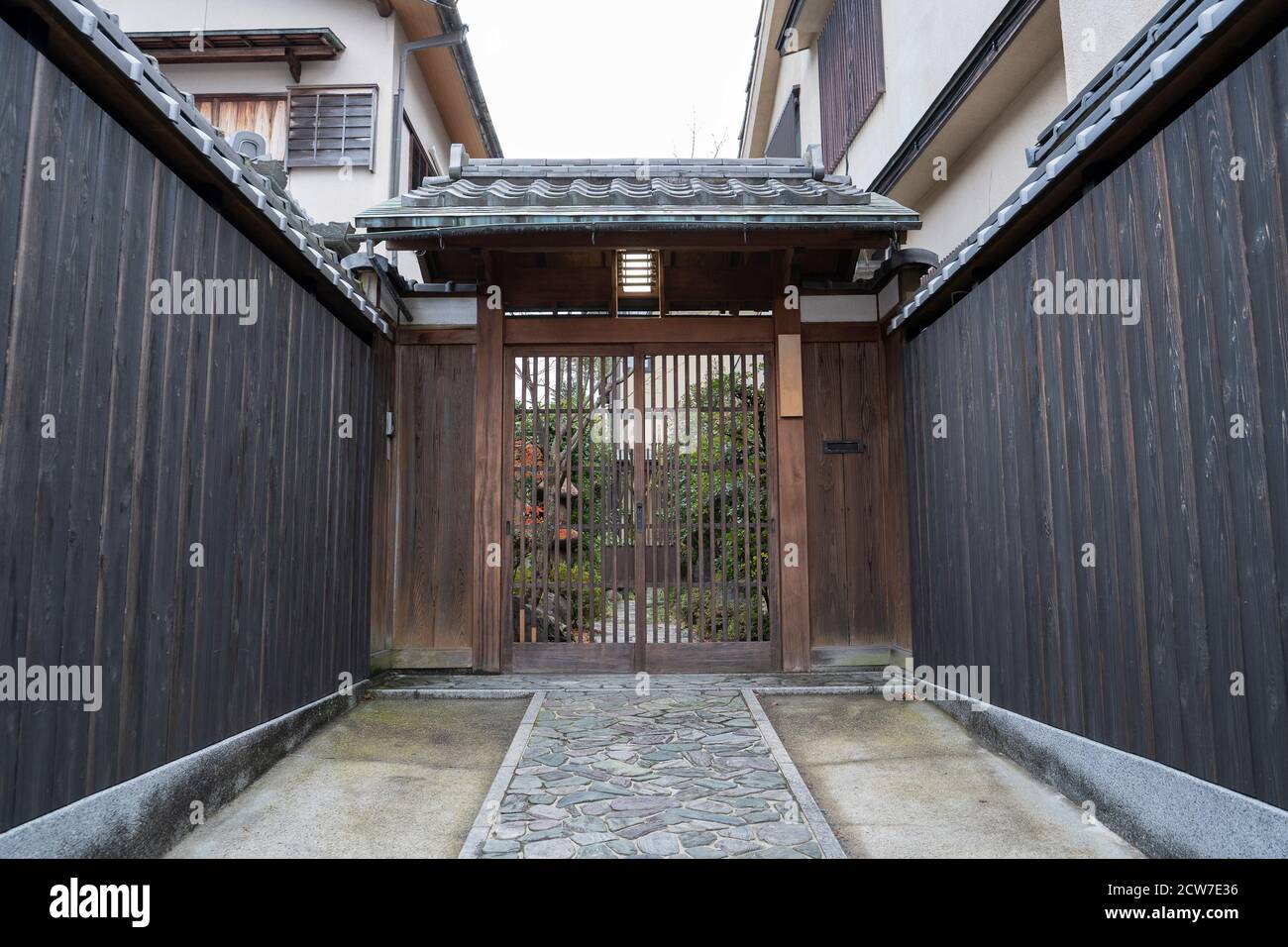 Old wood door house in japan Stock Photo - Alamy