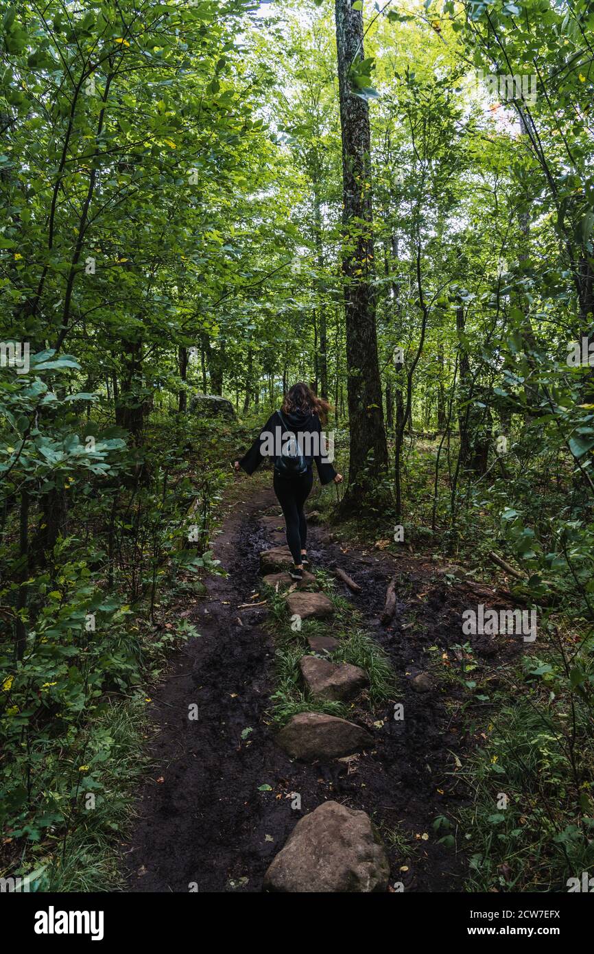 A young woman on a hike in the Adirondacks Stock Photo - Alamy