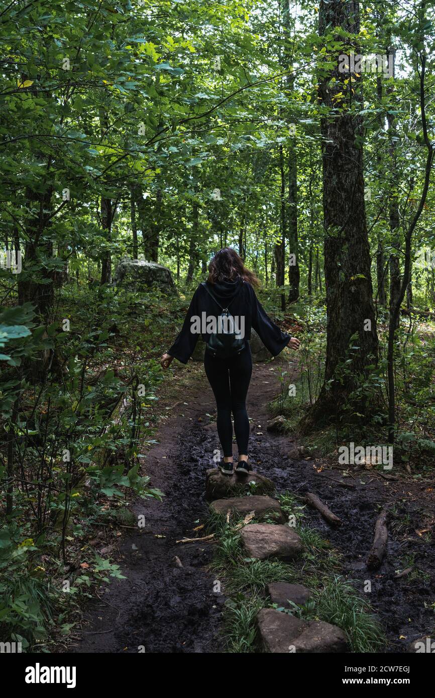 A young woman on a hike in the Adirondacks Stock Photo - Alamy