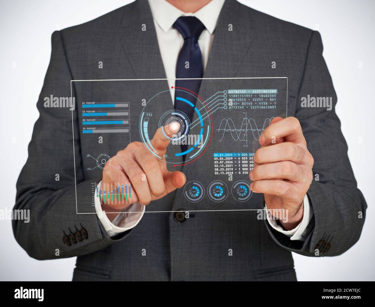 Businessman using a digital virtual touch screen Stock Photo