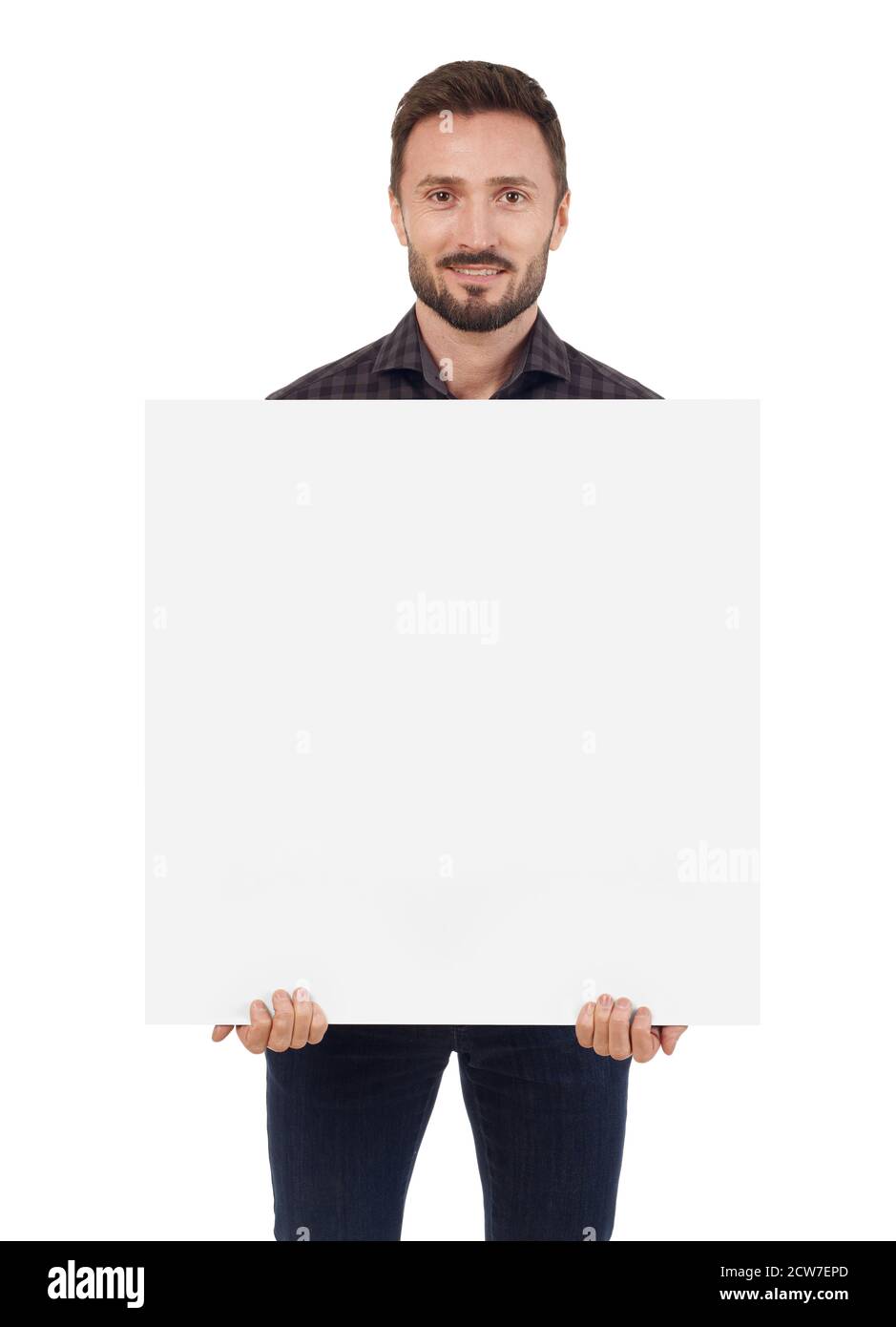 Man with blank sign looking at camera, white background Stock Photo