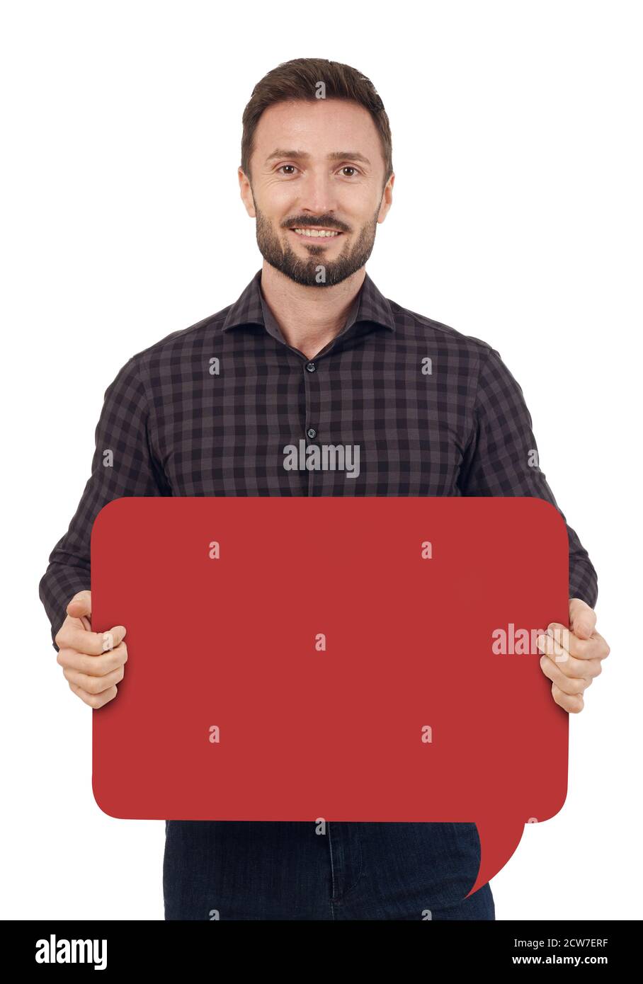 Man with speech bubble looking at camera, white background Stock Photo