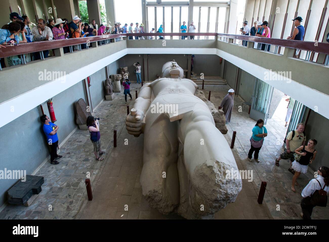 The colossal carved limestone statue of Pharaoh Ramesses ll on display the ancient Egyptian capital of Memphis at Mit Rahina in northern Egypt. Stock Photo