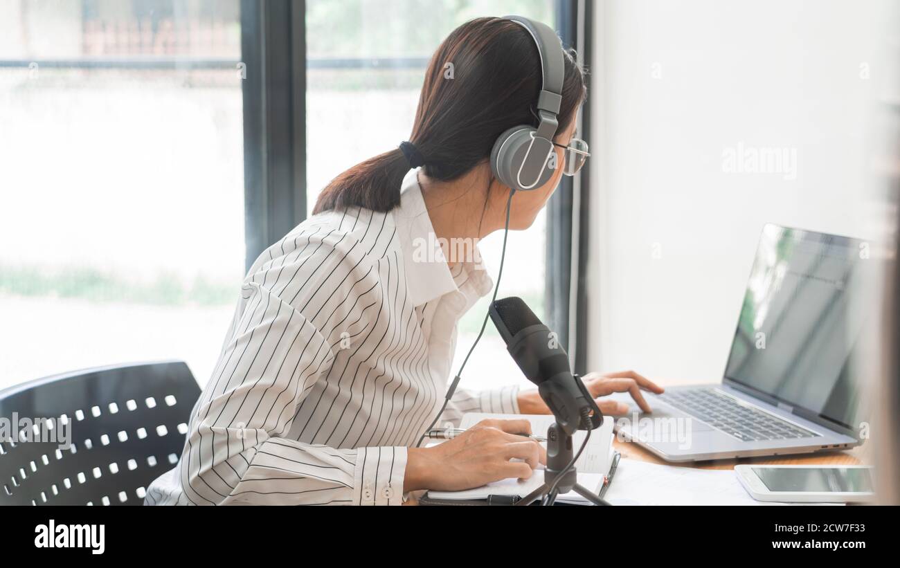 Podcaster Using A Microphone Asian girl vlogger talking camera hi-res stock photography and images ...