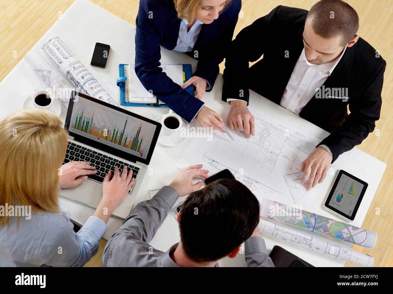 Development team at desk Stock Photo