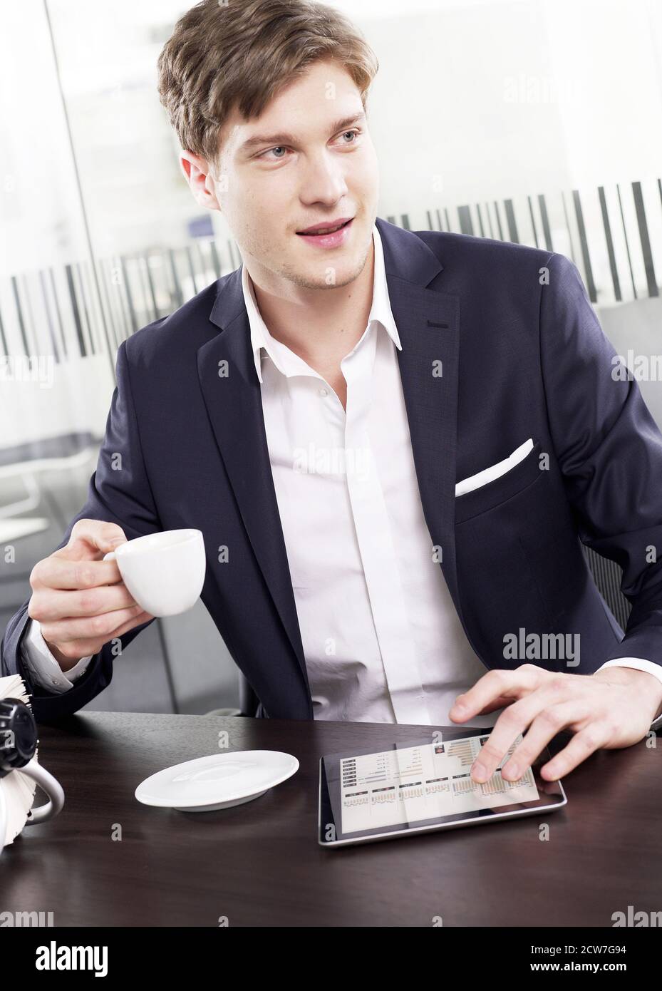 Businessman working on a digital tablet Stock Photo