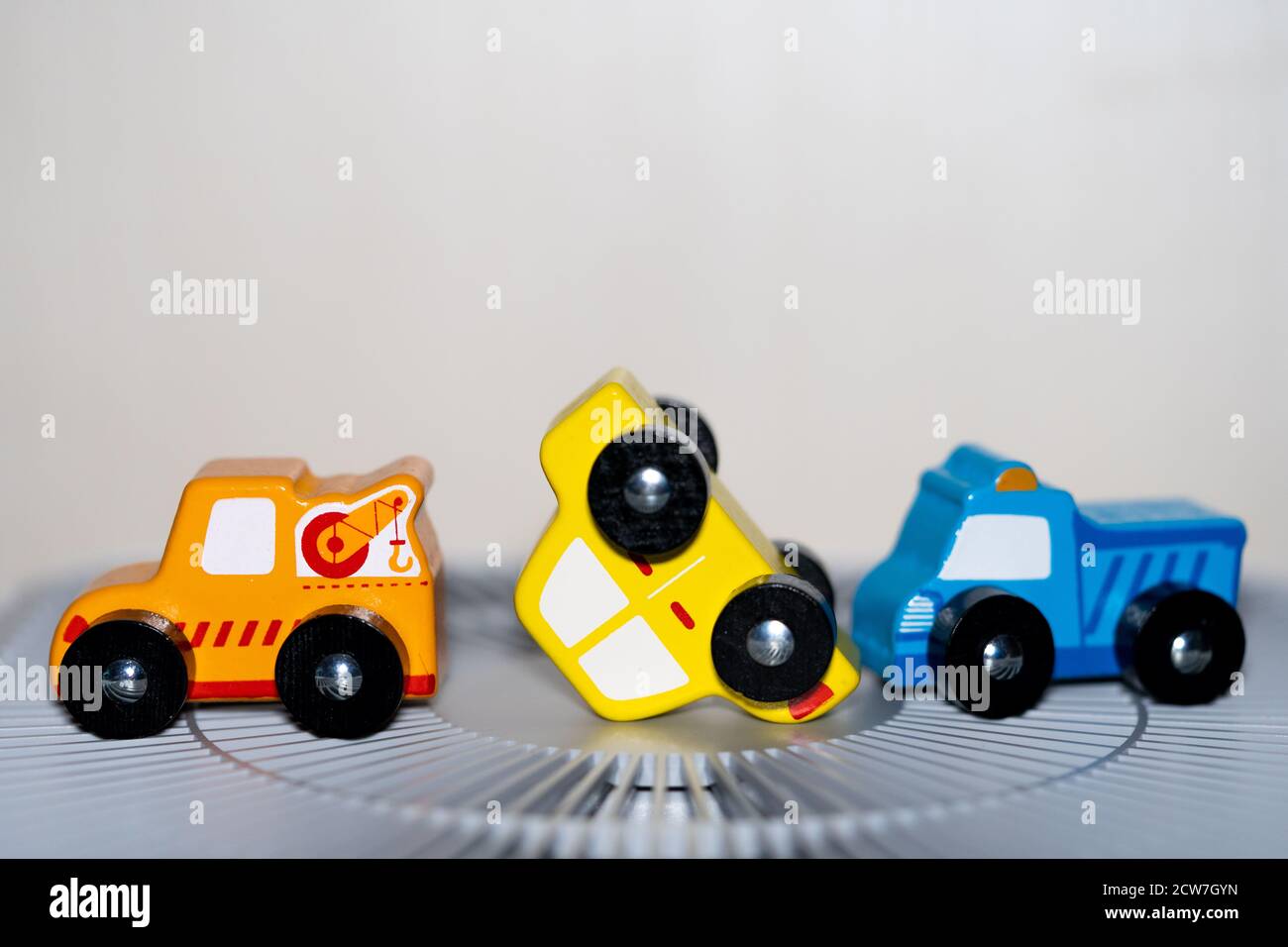 I made up the situation of car accident with toy car. Surprisingly, in Korea, tow trucks arrive as quickly as they were seen from somewhere. Stock Photo