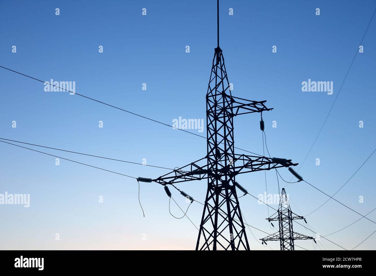 masts and wires on a background blue sky Stock Photo