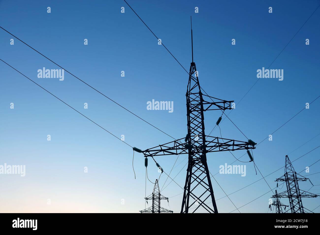 masts and wires on a background blue sky Stock Photo