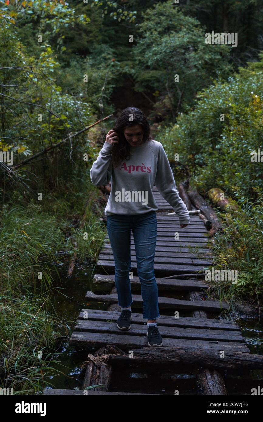 A young woman on a hike in the rain in the Adirondacks Stock Photo - Alamy