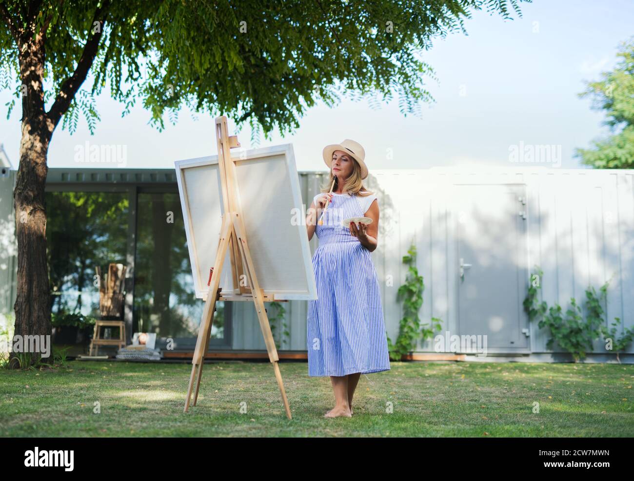 Mature woman barefoot outdoors hi-res stock photography and images - Alamy
