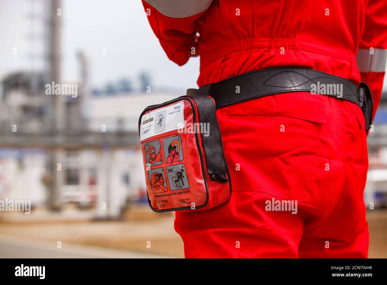 Oil refinery plant. Safety technologies. Compact gas mask. (breath mask, face mask) Zhaik-Munai oil deposit, Kazakhstan. Stock Photo