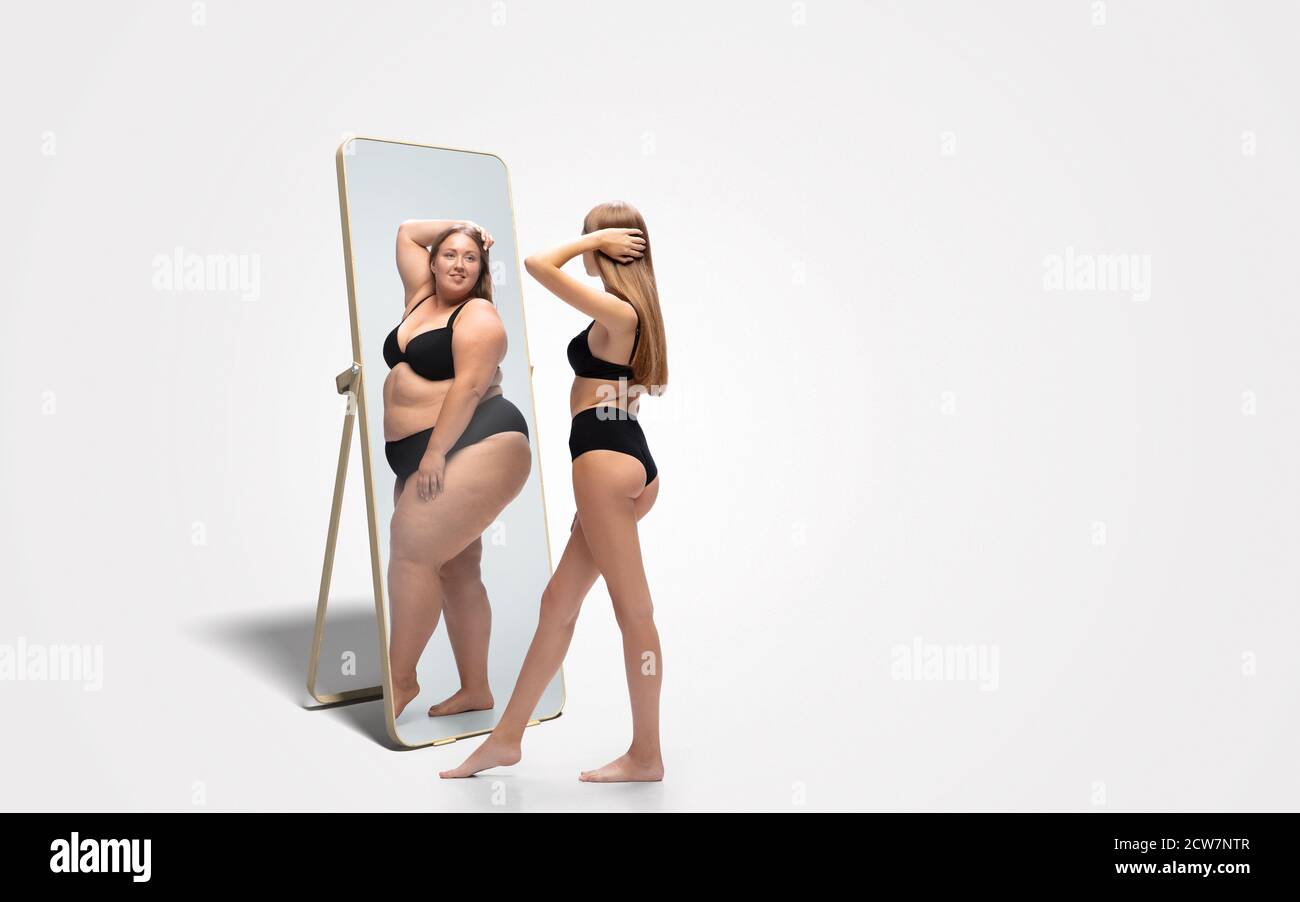 Skinny girl mirror fat hires stock photography and images Alamy