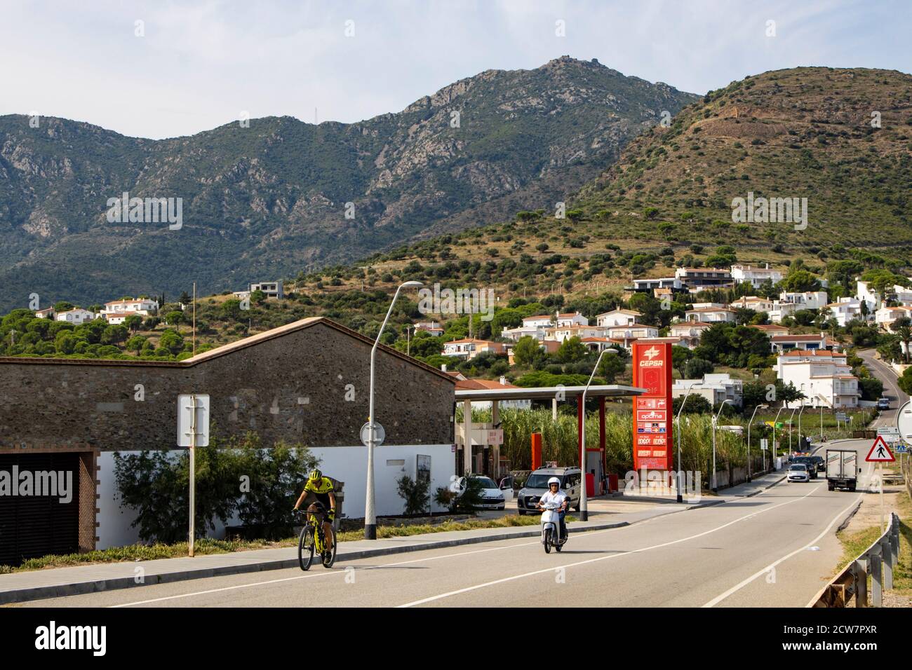 Road and petrol station in the centre of Puerto de la Selva, Catalonia, Spain Stock Photo