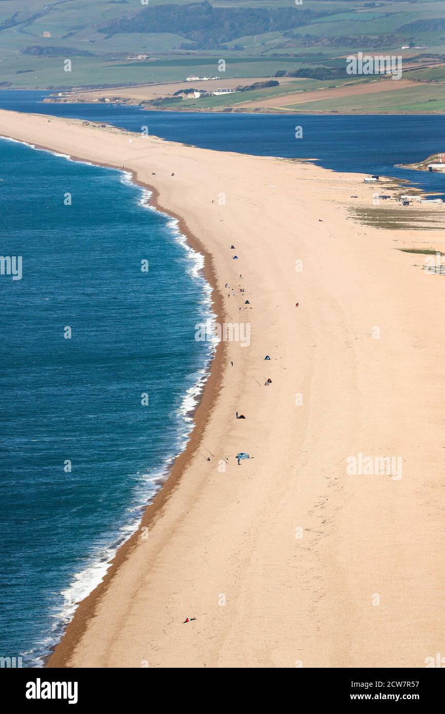 Aerial image of Chesil Beach Chesil Bank, 29 km long shingle beach, a  tombolo connecting mainland to the Isle of Portland, Jurassic Coast, UNESCO  Worl - SuperStock