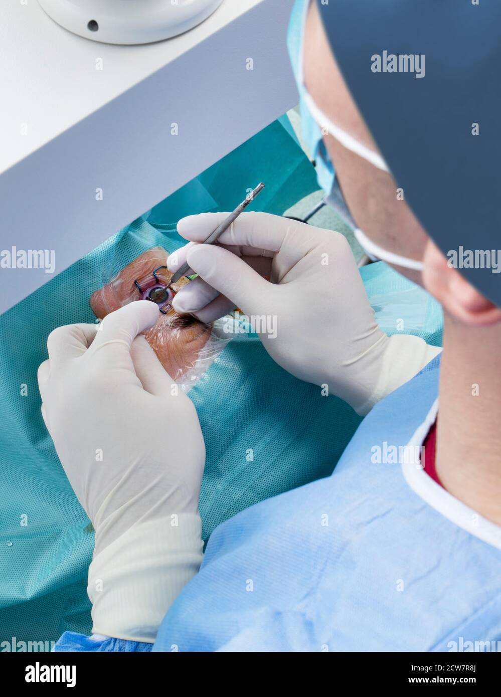 Date Witheye Open Woman with eye open in hospital and surgeon with medical equipment ...