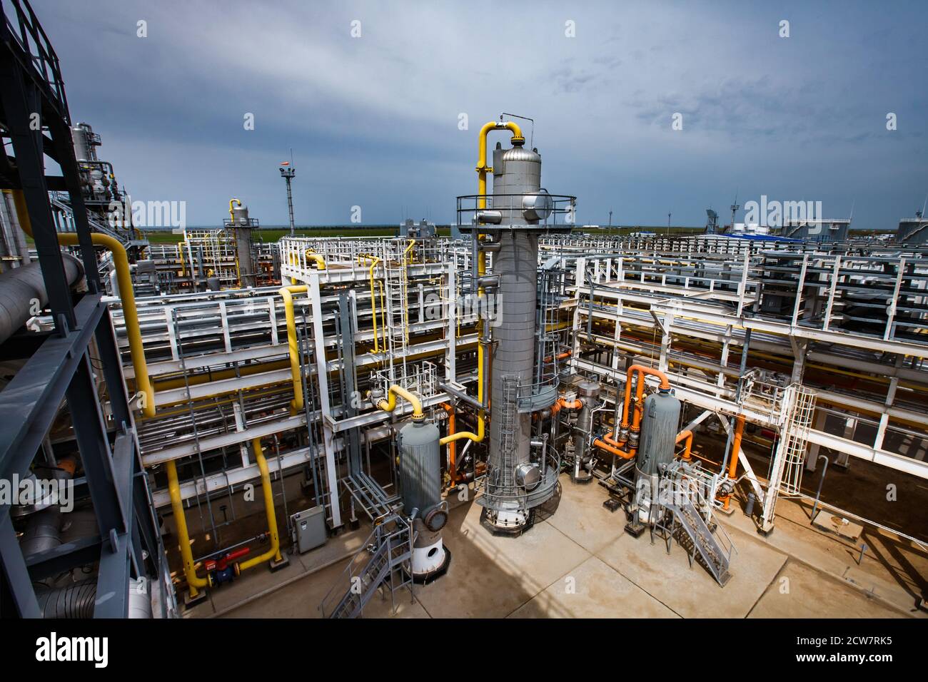 Distillation towers (columns), pipes and pipeline system. Oil refinery