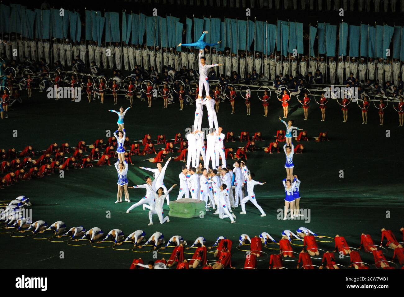 08.08.2012, Pyongyang, North Korea - Mass choreography and Artistic Performance with dancers and acrobats at May Day Stadium during Arirang Festival. Stock Photo