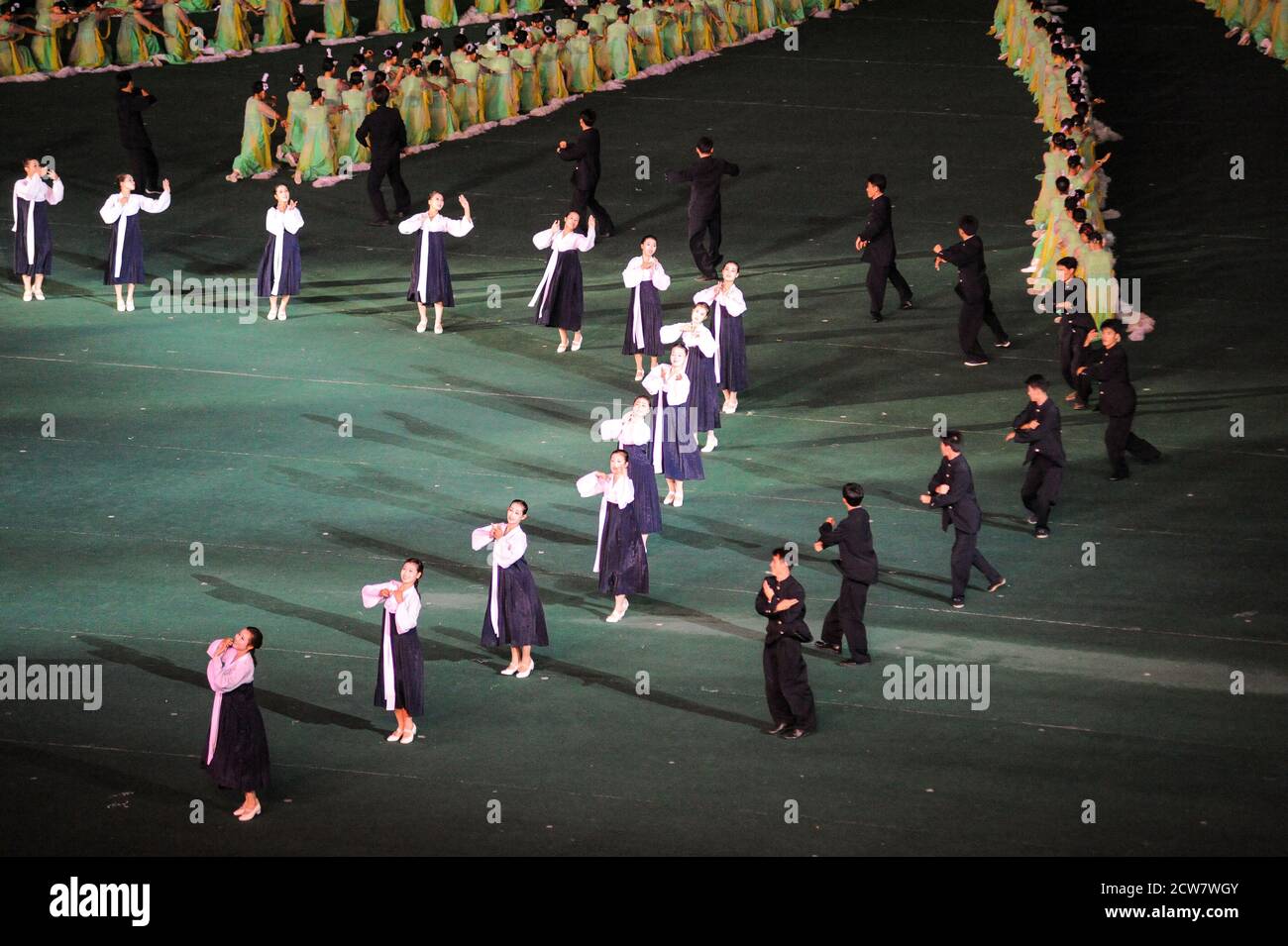 08.08.2012, Pyongyang, North Korea - Mass choreography and Artistic Performance with dancers and acrobats at May Day Stadium during Arirang Festival. Stock Photo
