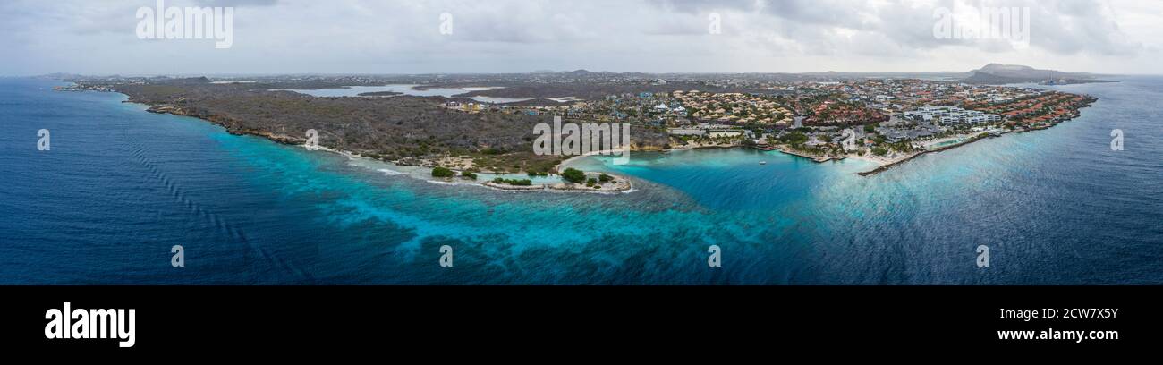 Aerial view of coast of Curaçao in the Caribbean Sea with turquoise water, cliff, beach and beautiful coral reef Stock Photo