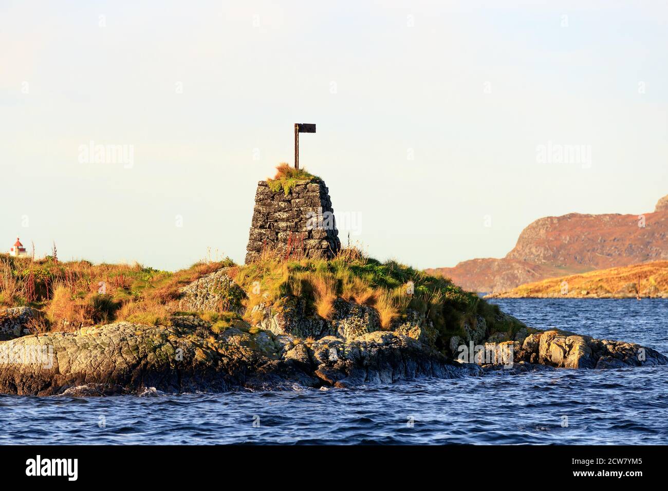 RUNDE, NORWAY - 2017 OCTOBER 19. Sea navigation stone mark on the Island in Norway. Stock Photo