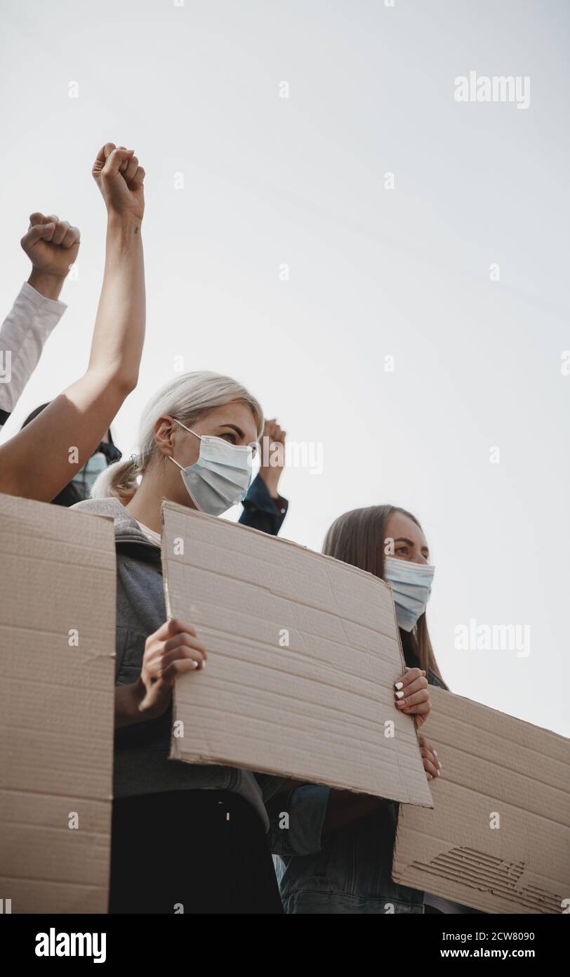 Freedom. Group of activists giving slogans in a rally. Caucasian men ...