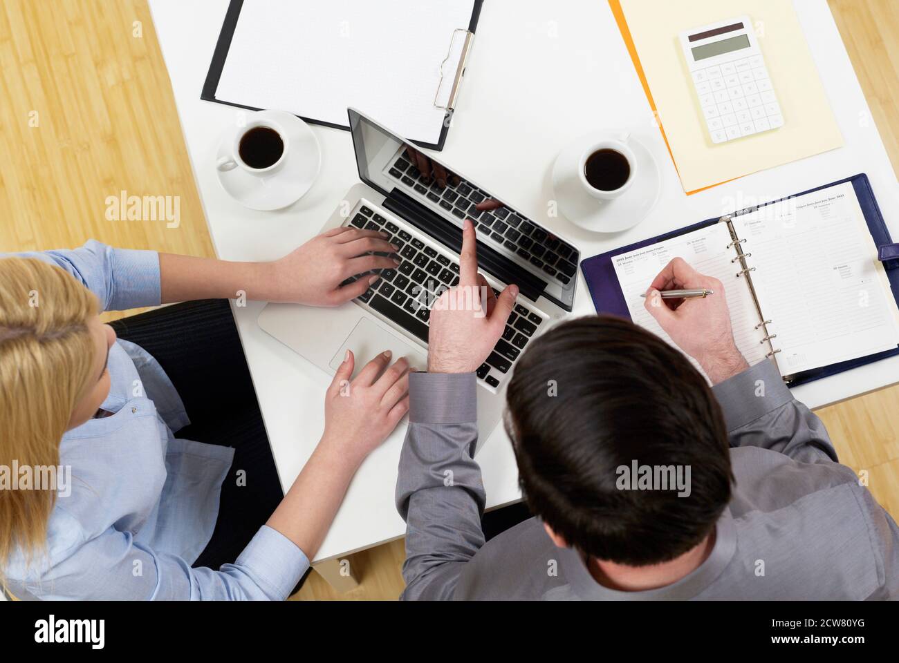 Development team at desk Stock Photo