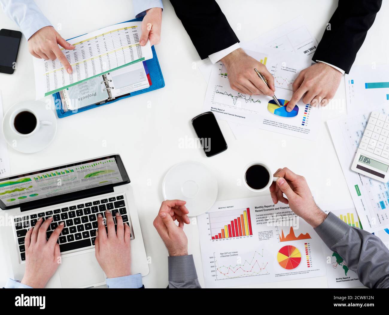Discussing data over tablet hi-res stock photography and images - Alamy