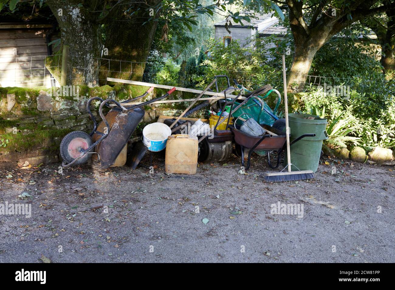 Group of tarmac laying tools resting overnight prior to work Stock Photo