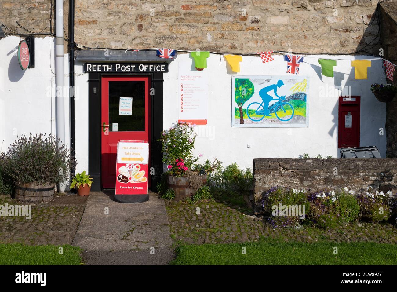 Reeth Post Office welcoming the 2020 tour de yorkshire, Yorkshire Dales, Stock Photo