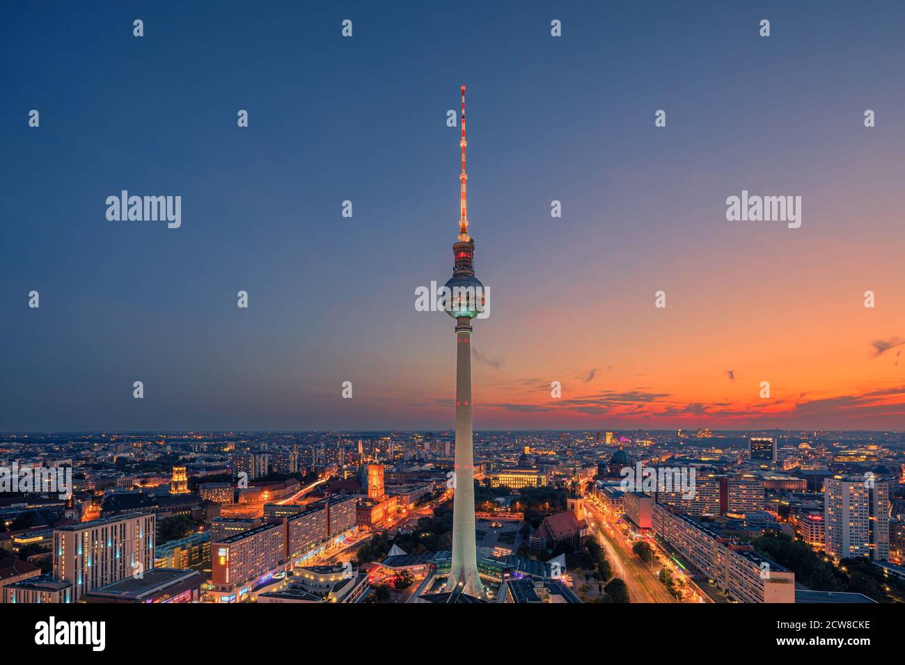 Sunset at the Berlin TV Tower. The Berliner Fernsehturm or Fernsehturm Berlin (English: Berlin Television Tower) is a television tower in central Berl Stock Photo