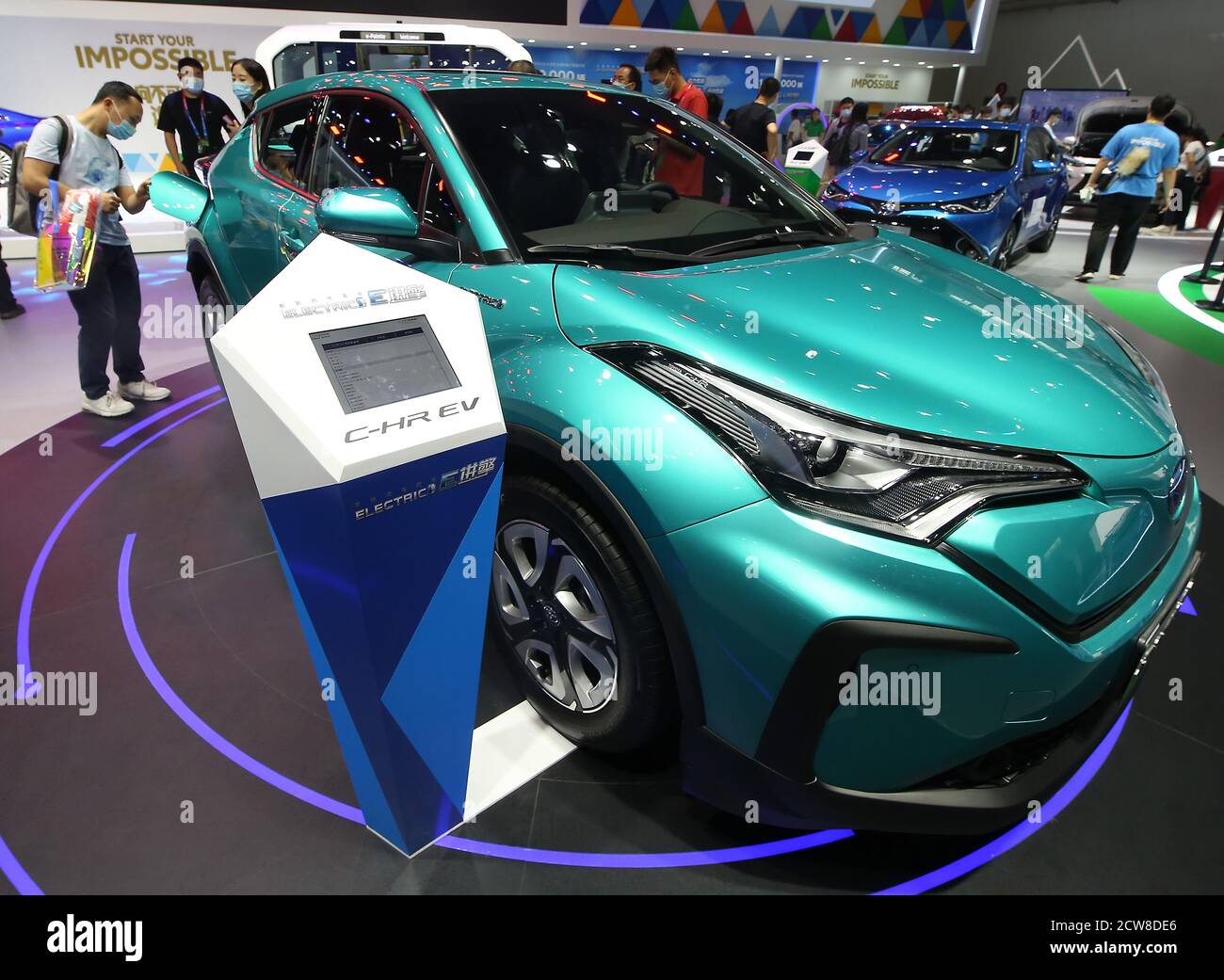 Beijing, China. 28th Sep, 2020. Chinese check-out Toyota's new electric C-HV car (EV) at the international Auto Show 2020 in Beijing on Monday, September 28, 2020. China's auto market, the biggest in the world, has rebounded smartly from the coronavirus crash in recent months, auto executives said this week, as a rare in-person trade show was dominated by talk of economic recovery. Photo by Stephen Shaver/UPI Credit: UPI/Alamy Live News Stock Photo