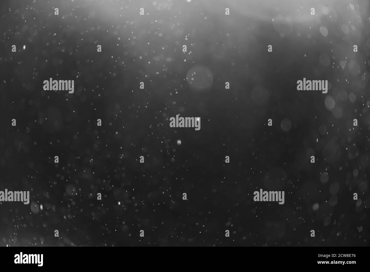 Snow Or Rain Bokeh Texture Overlay On Black Background Stock Photo Alamy