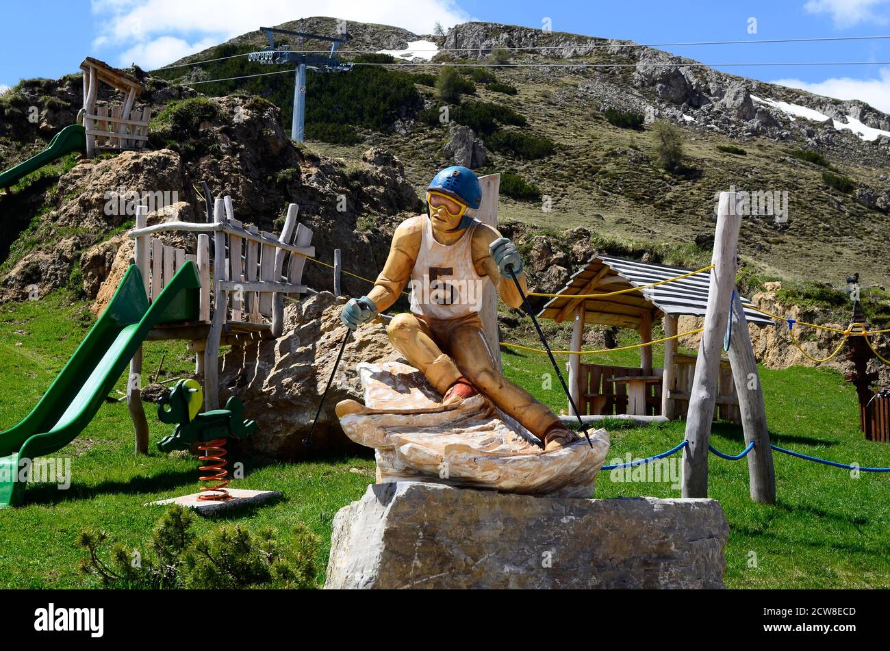 Italy, South Tyrol, Alpe di Siusi, wooden ski racer Stock Photo