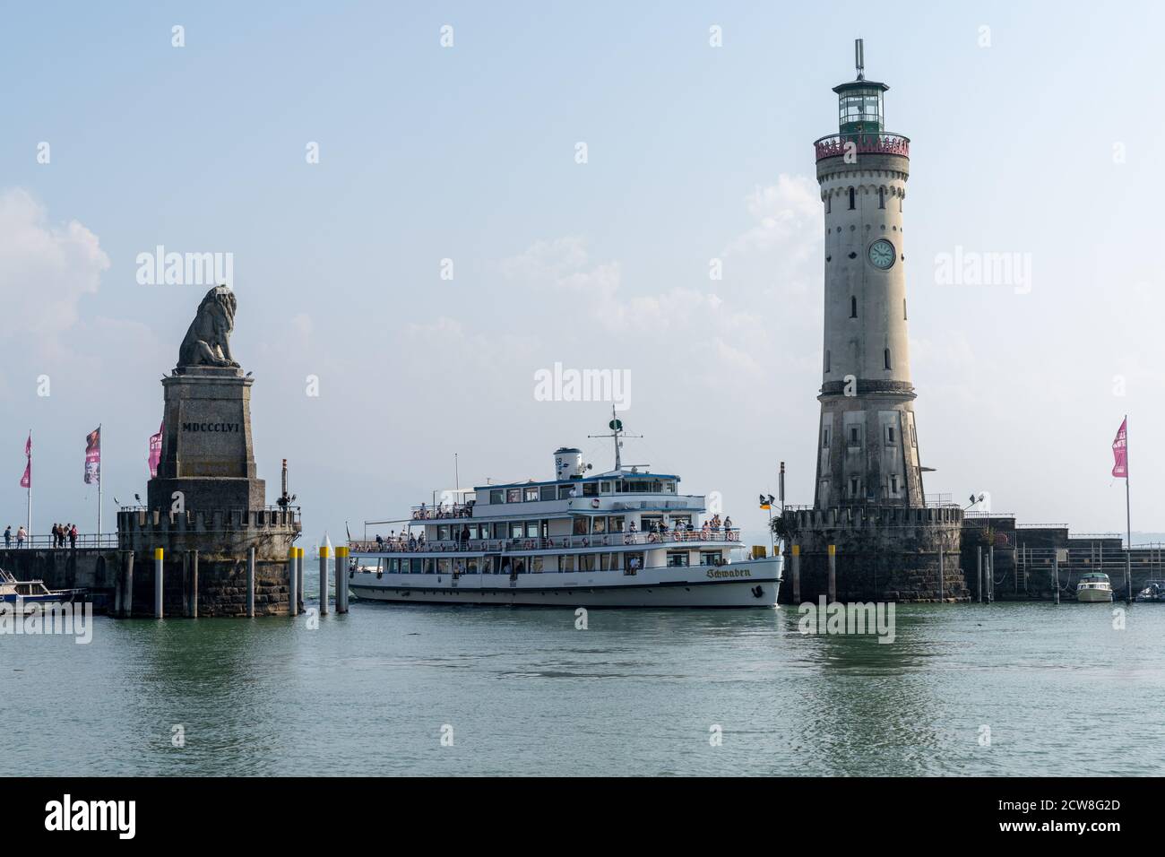 Lindau, Bavaria / Germany - 20 September 2020: passenger ship enters the protected harbor on Lindau Island on Lake Constance in Bavaria Stock Photo