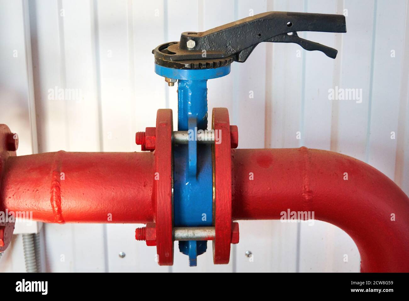 A valve on the hot water pipeline Stock Photo Alamy