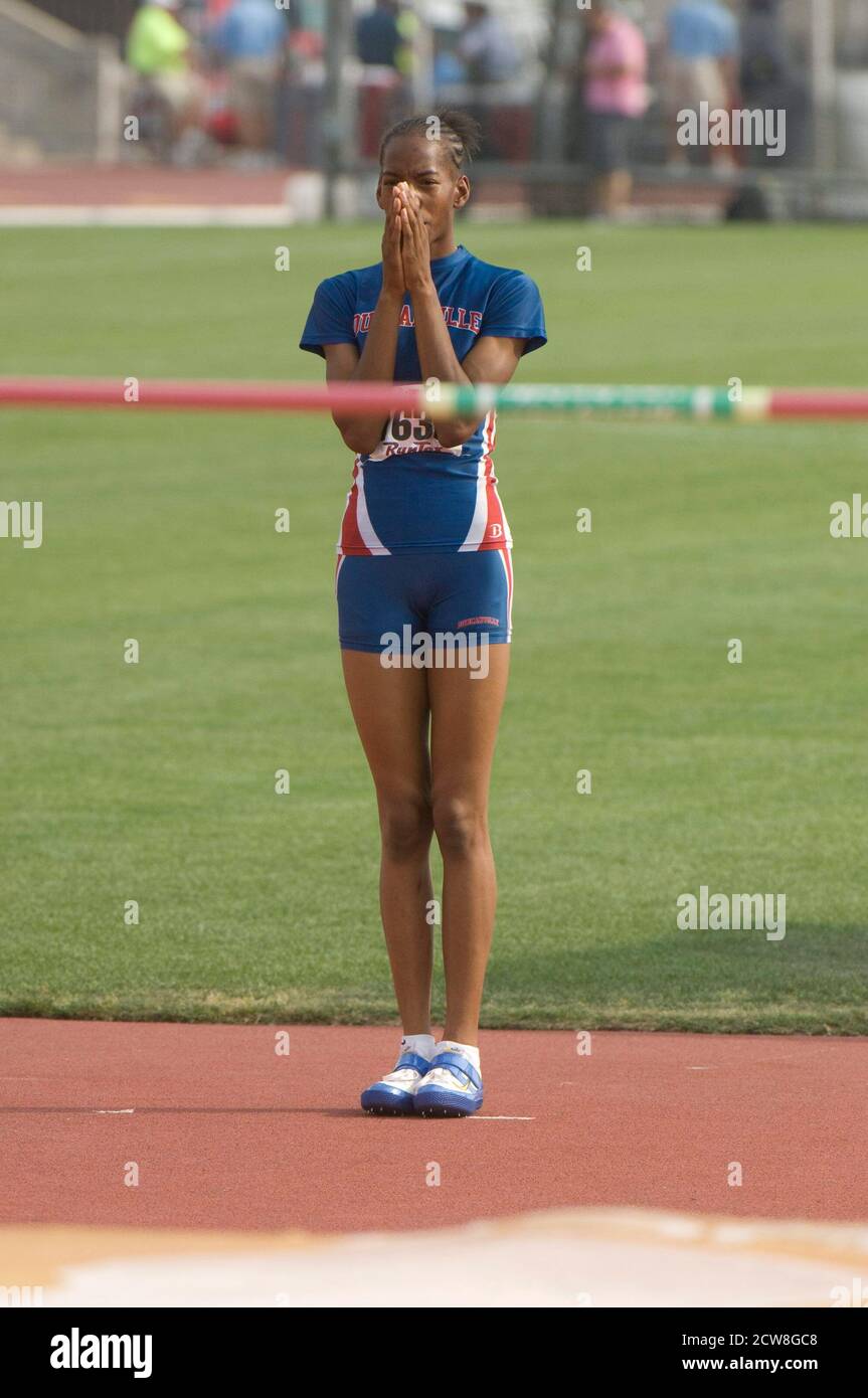 Austin, TX May 10, 2008: African-American girl concentrates before running to the high-jump bar at the Texas high school state championship track and field meet at the University of Texas at Austin. ©Bob Daemmrich Stock Photo