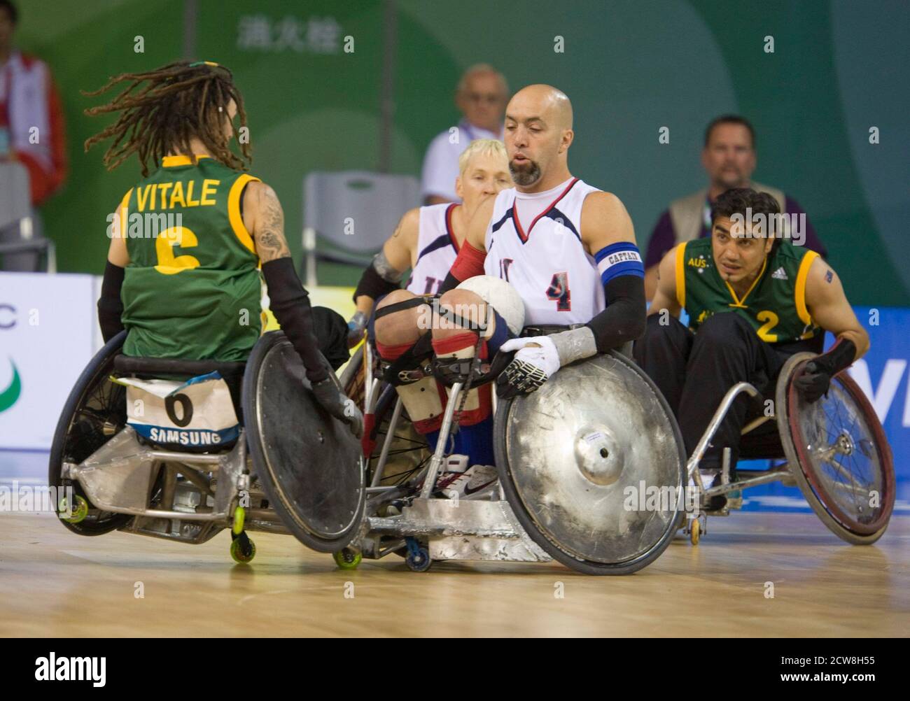 Beijing, China  September 14, 2008: Day 10 of athletic competition at the 2008 Paralympic Games showing the United States (white) Bryan Kirkland sandwiched between Australia's Scott Vitale (6) and Nazim Erdem (2) in the men's wheelchair rugby gold medal matchup.  ©Bob Daemmrich Stock Photo