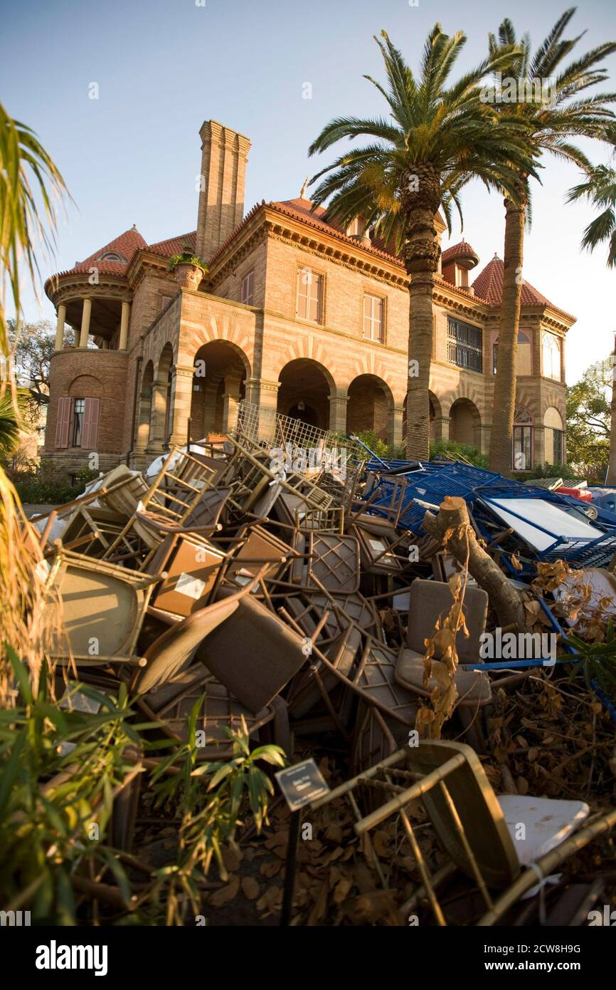 Galveston, Texas September 27, 2008:  A trash heap covers the grounds outside the historic Sealy Mansion in historic Galveston as residents struggle to clean up the mess more than two weeks after Hurricane Ike ravaged the Texas Coast. ©Bob Daemmrich Stock Photo
