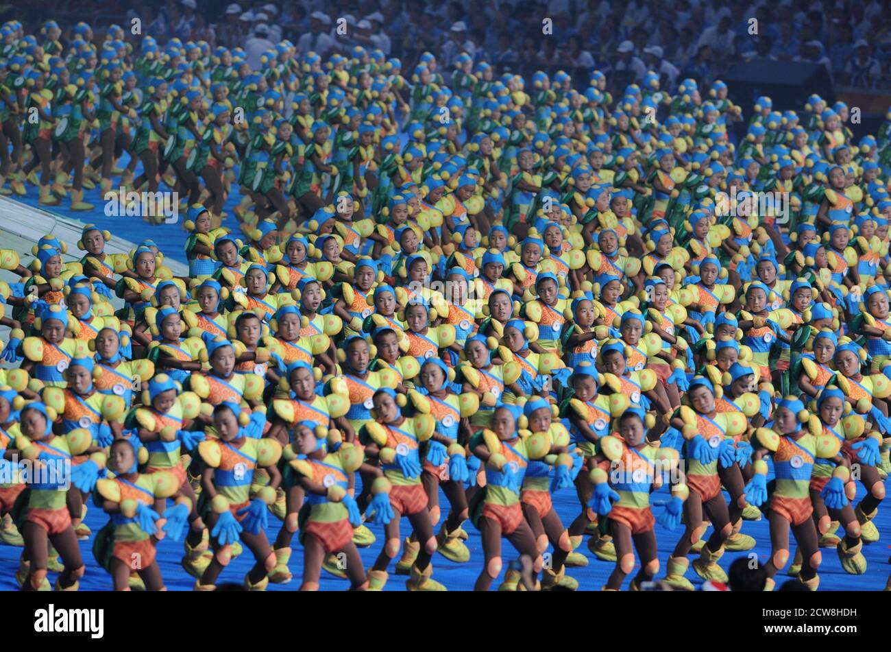 Beijing, China  September 6, 2008: 'Space Robots,' children in costume, perform at the Opening Ceremonies of the Beijing Paralympics at China's National Stadium, known as the Bird's Nest.  ©Bob Daemmrich Stock Photo