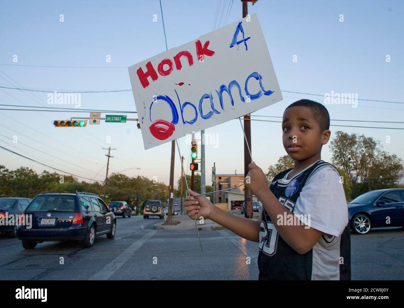 Austin, Texas November 4, 2008:  Election day on the predominately African-American near east side of downtown Austin showing Barack Obama supporters outside a polling place.   ©Bob Daemmrich Stock Photo