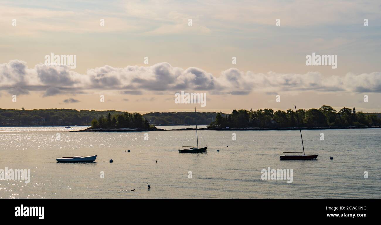 boats moored in the evening on Linekin Bay, Maine Stock Photo