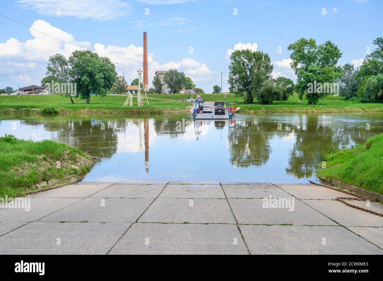 ANGERN AN DER MARCH, AUSTRIA – JULY 21 2020: Ferry from Austria to Slovakia on Morava river, from town Angern an der March to village Zahorska Ves Stock Photo