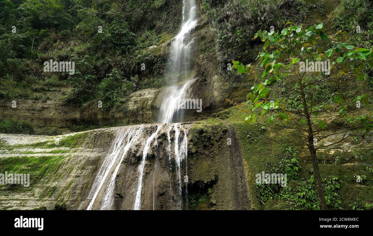 Can-umantad Falls in green forest. Waterfall in the tropical mountain ...