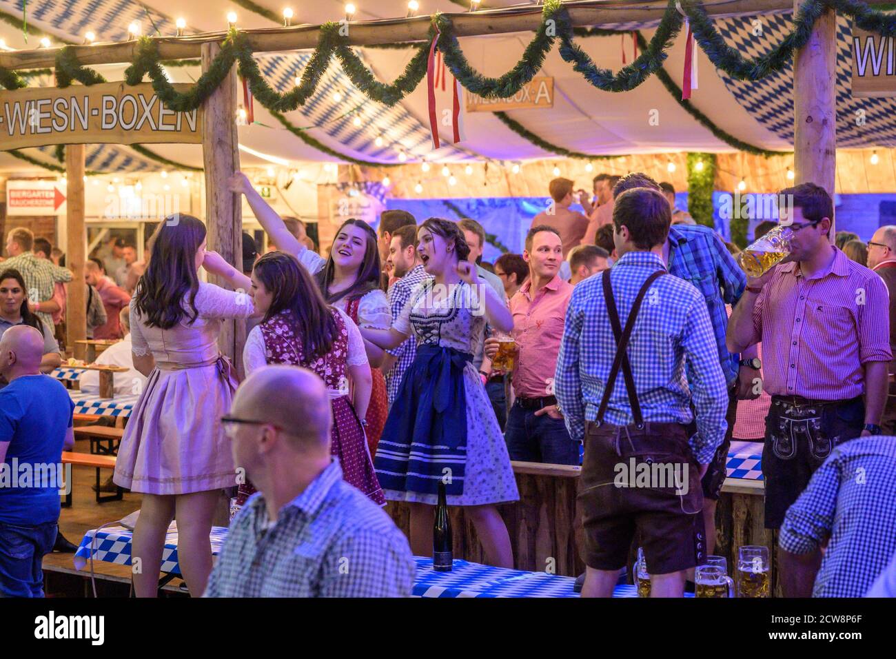 Koblenz Germany 27.09.2019 people party at Oktoberfest in europe during a concert Typical beer tent scene. Stock Photo