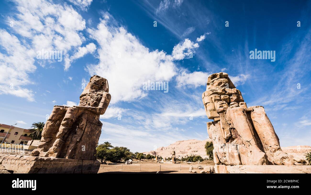 The Colossi of Memnon are two giant stone statues of Pharaoh Amenhotep