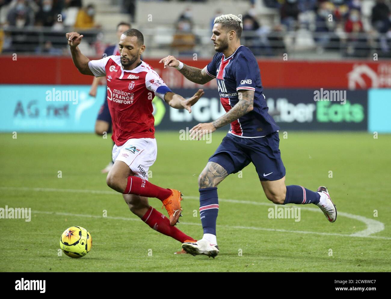 Yunis Abdelhamid of Reims, Mauro Icardi of PSG during the French  championship Ligue 1 football match between Stade de Reims and Paris  Saint-Germain on Stock Photo - Alamy