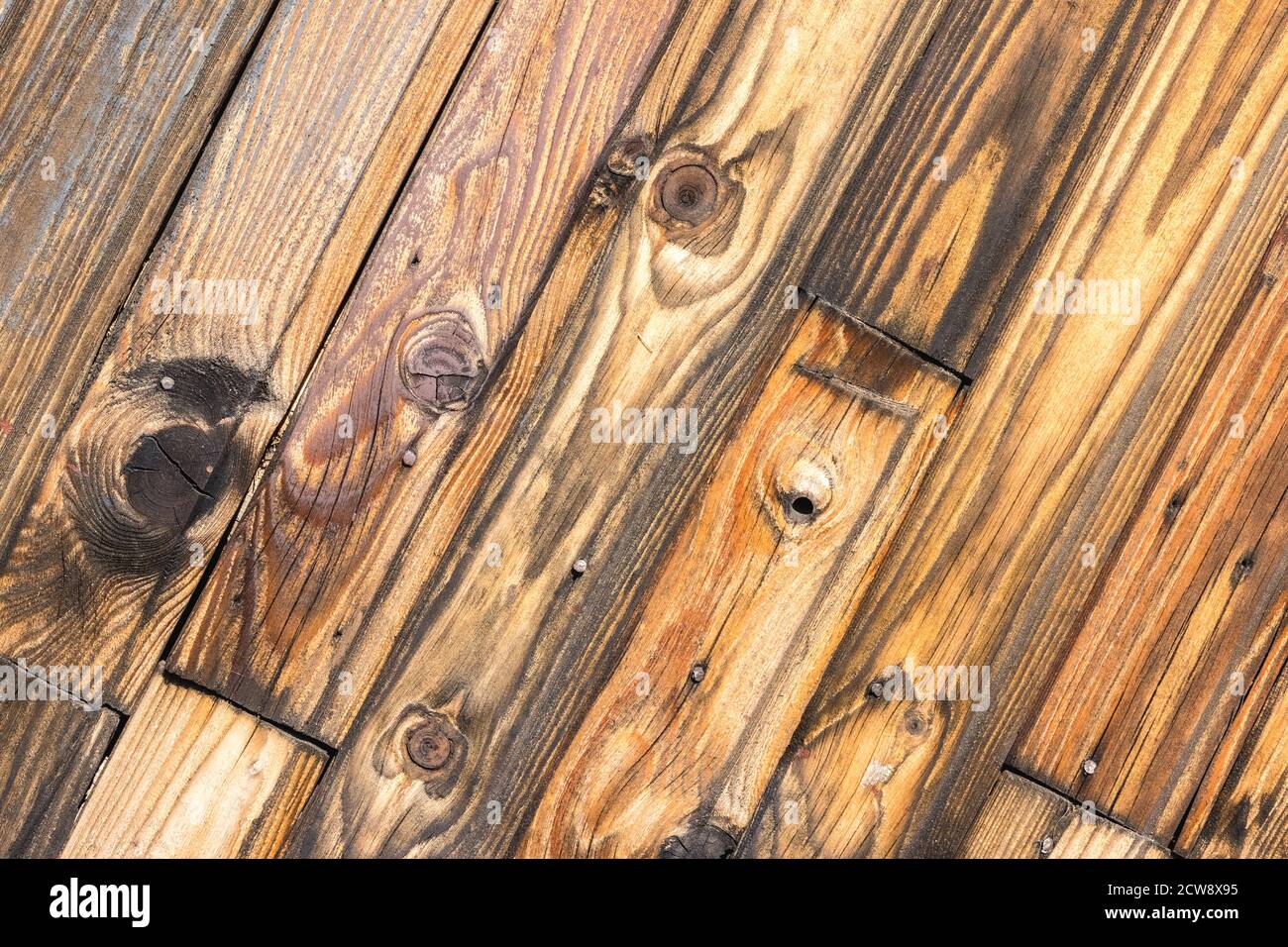 Wooden background made from narrow diagonal boards Stock Photo