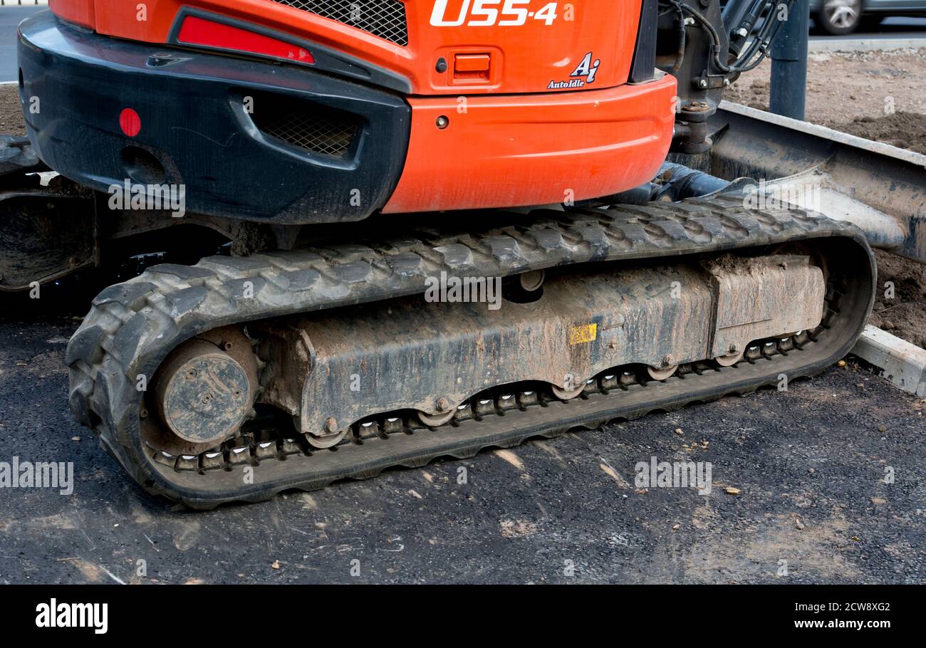 Caterpillar tracks on a digger vehicle, UK Stock Photo